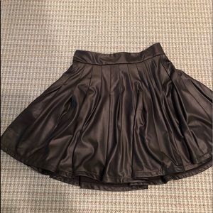 Girls black shiny skirt  Un Deux Trois. size 10